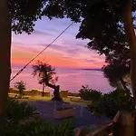 Casa Baia Rosa Casa de Férias *